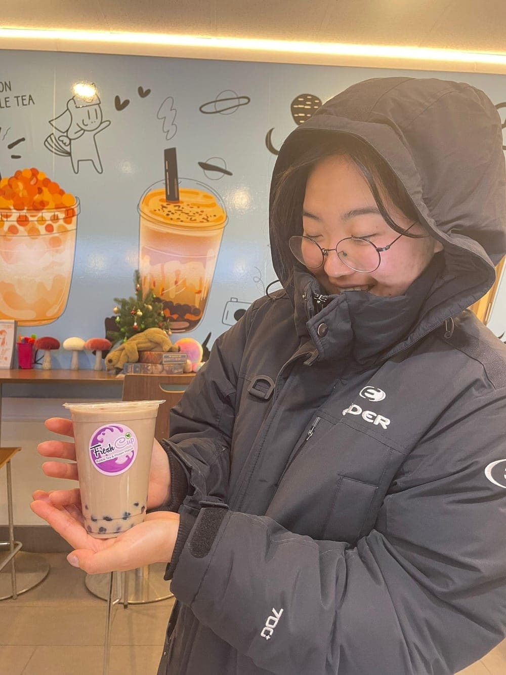 Regular Fresh Cup customer with a milk tea in North York